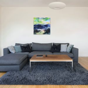 Emanuel crossing stormy seas with green sky an oil painting on canvas with 24ct gold leaf hanging over settee in lounge